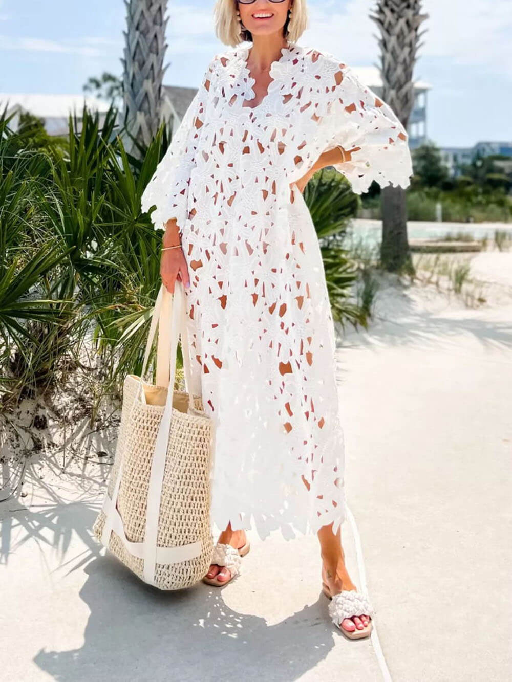 Raquel - Robe midi à manches longues à oeillets floraux