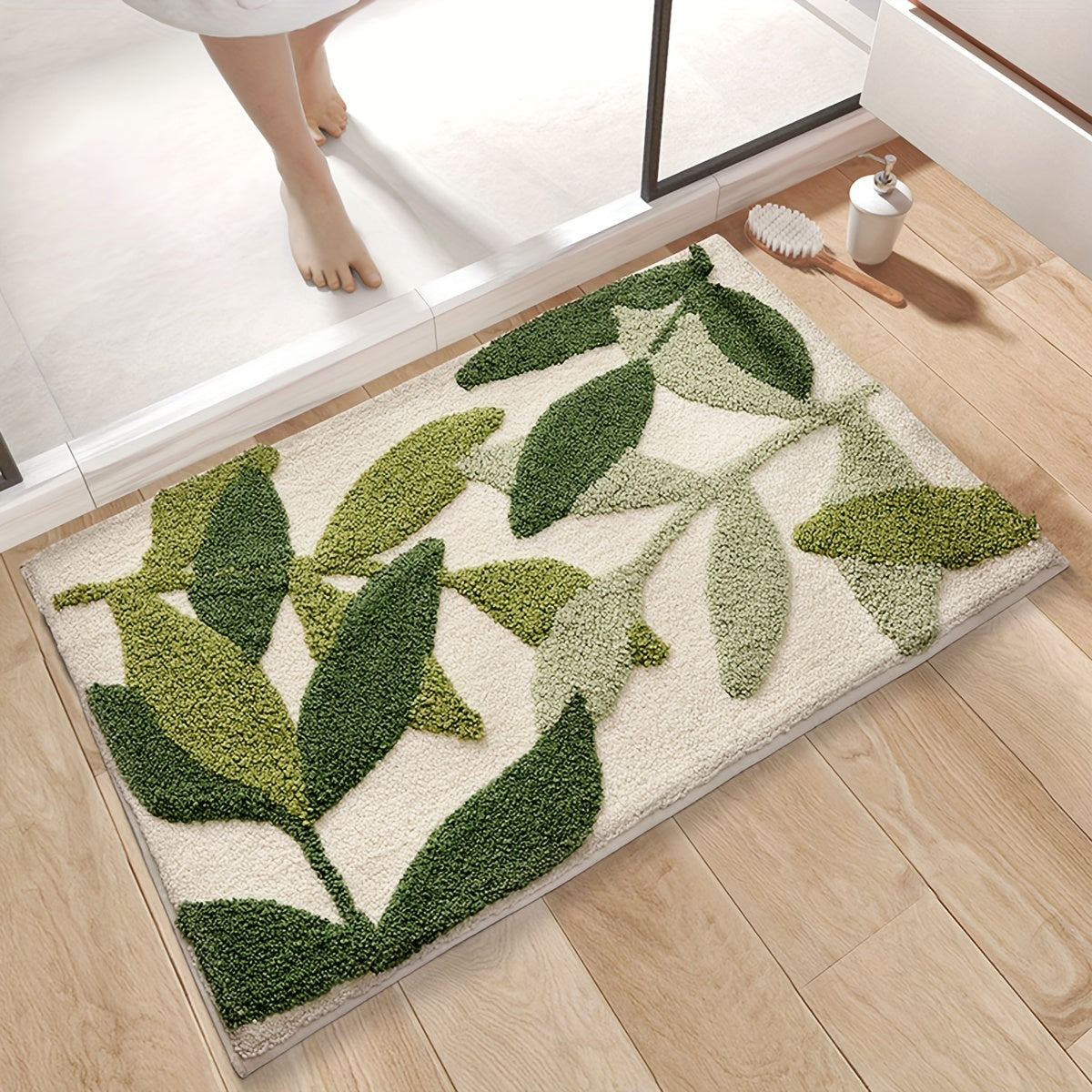 Tapis de bain Fien absorbant avec un élégant motif de feuilles – Confort antidérapant pour les salles de bain modernes