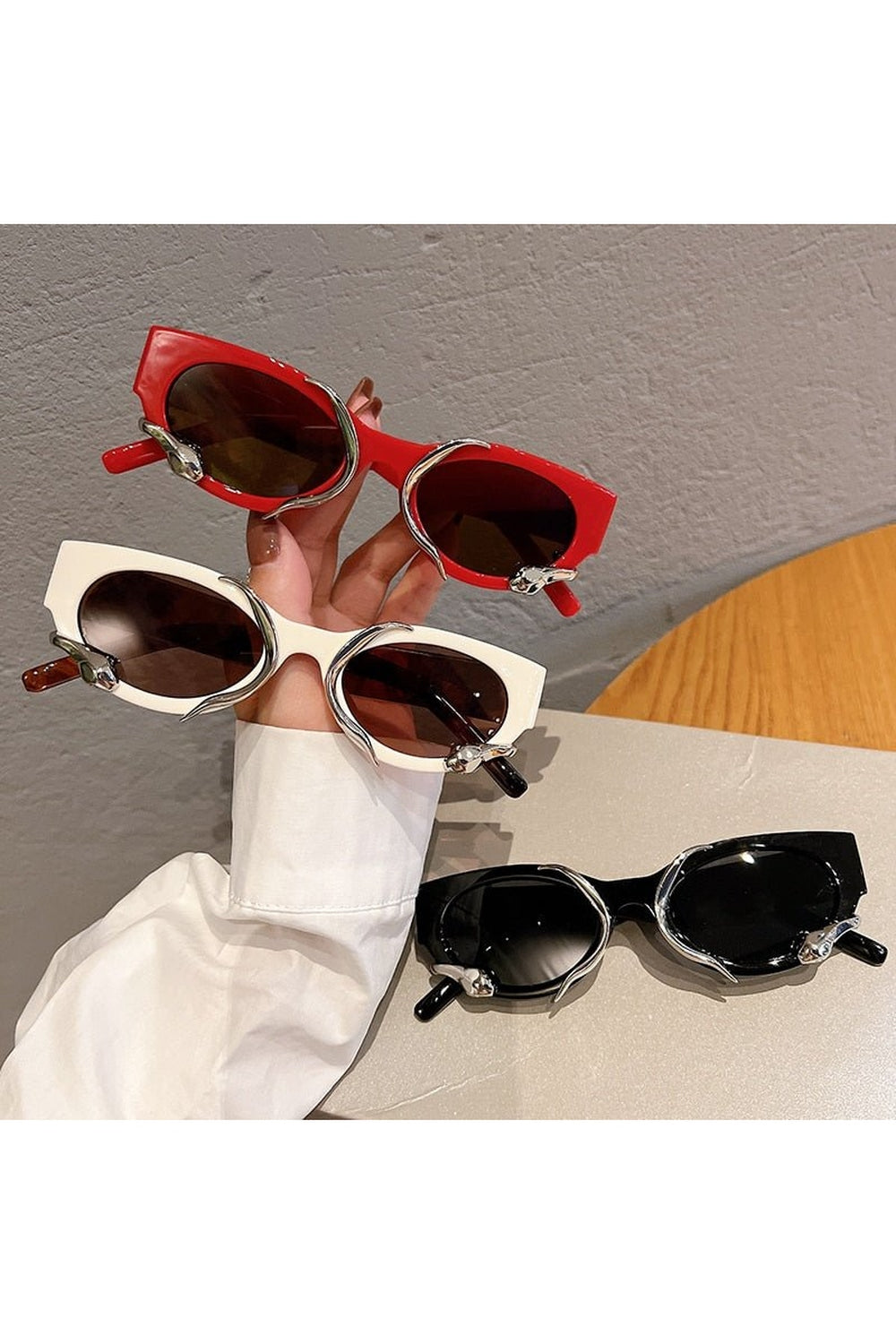 Lunettes de soleil œil de chat à motif serpent
