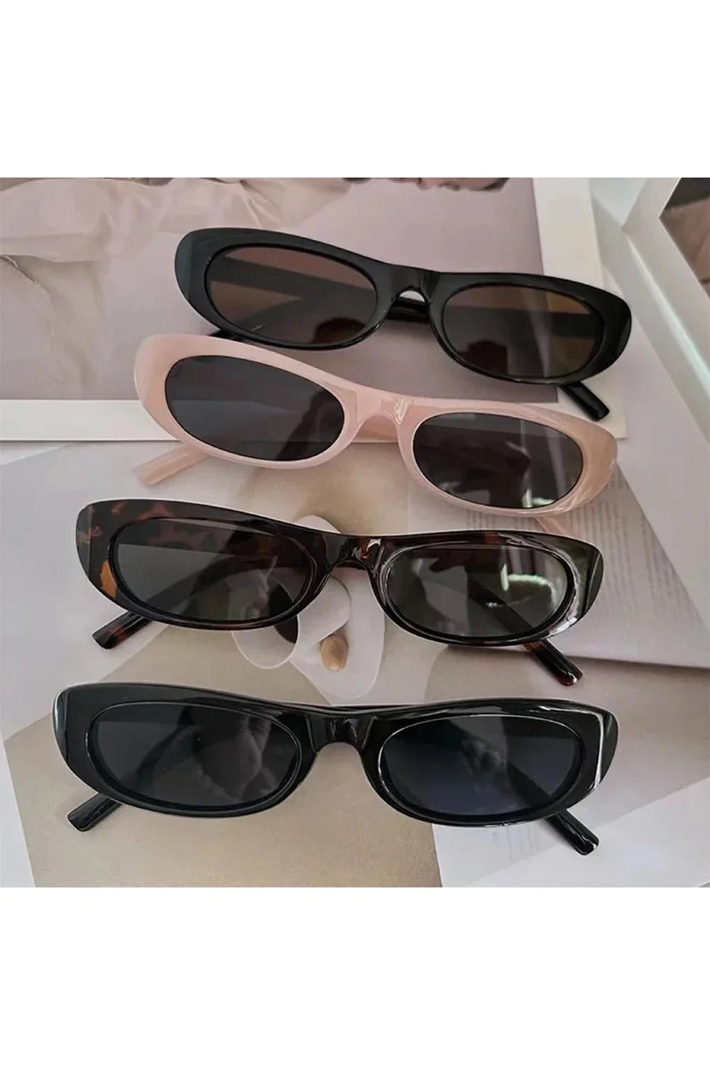 Lunettes de soleil œil de chat à monture étroite