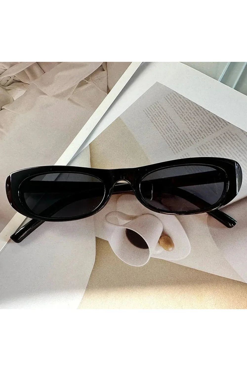 Lunettes de soleil œil de chat à monture étroite
