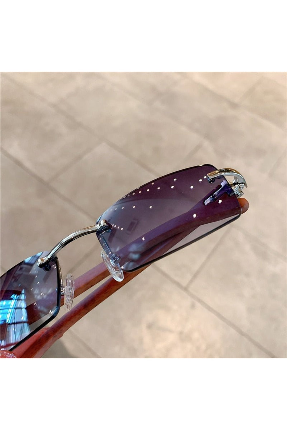 Lunettes de soleil sans monture à motif bois