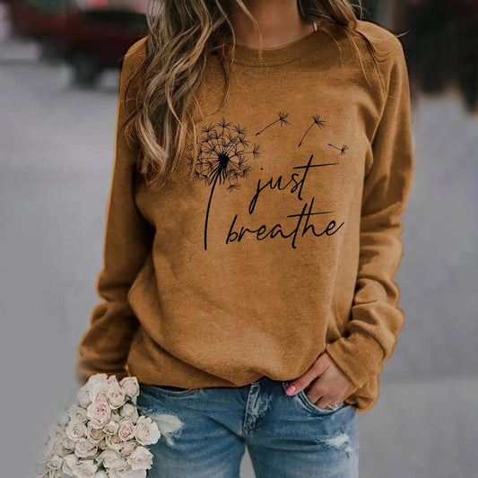 Sweat-shirt pour les femmes avec un motif "juste respirer" - confortable et inspirant pour la vie quotidienne