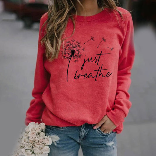 Sweat-shirt pour les femmes avec un motif "juste respirer" - confortable et inspirant pour la vie quotidienne